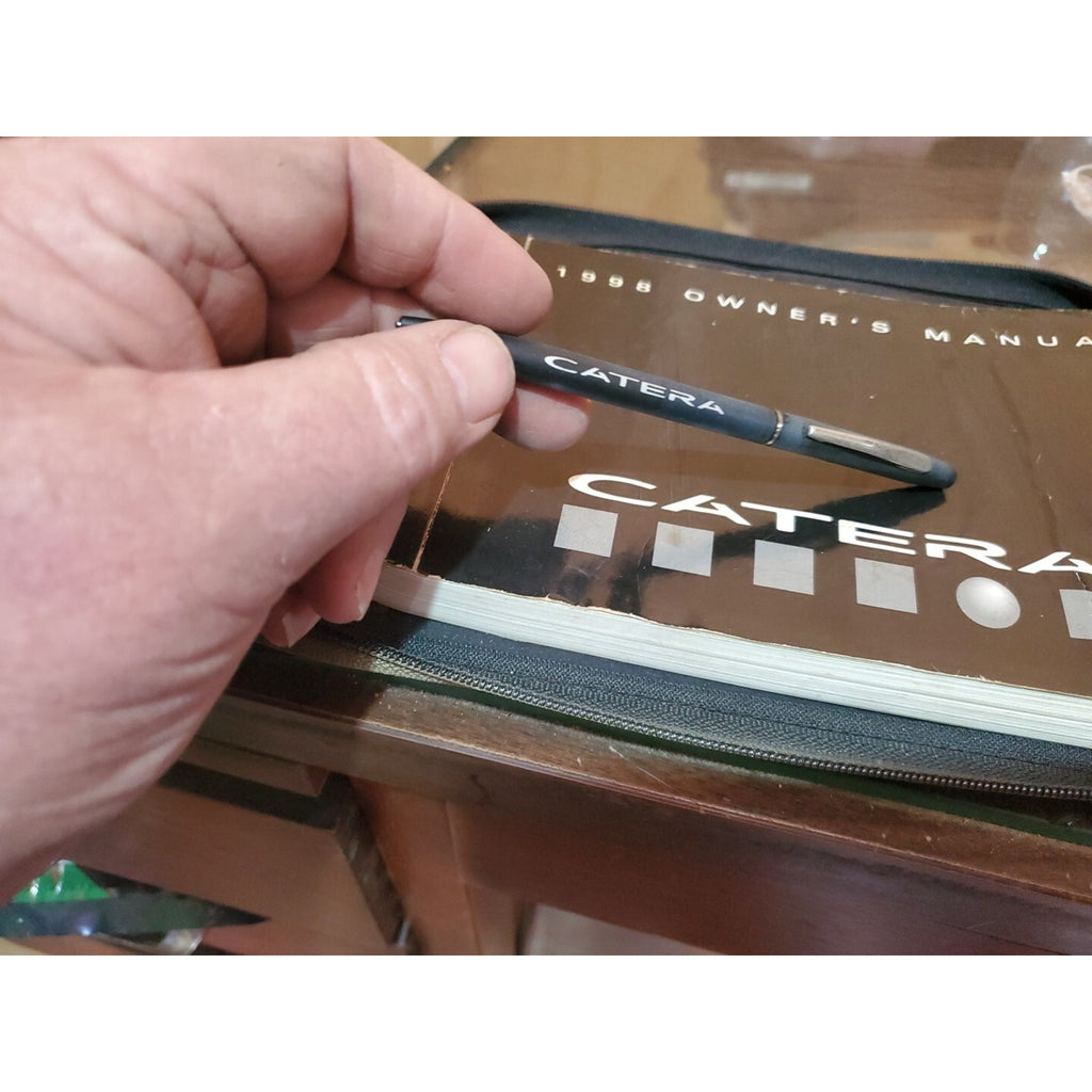 1998 CADILLAC CATERA OWNERS MANUAL SET W/ LEATHER CASE & PEN