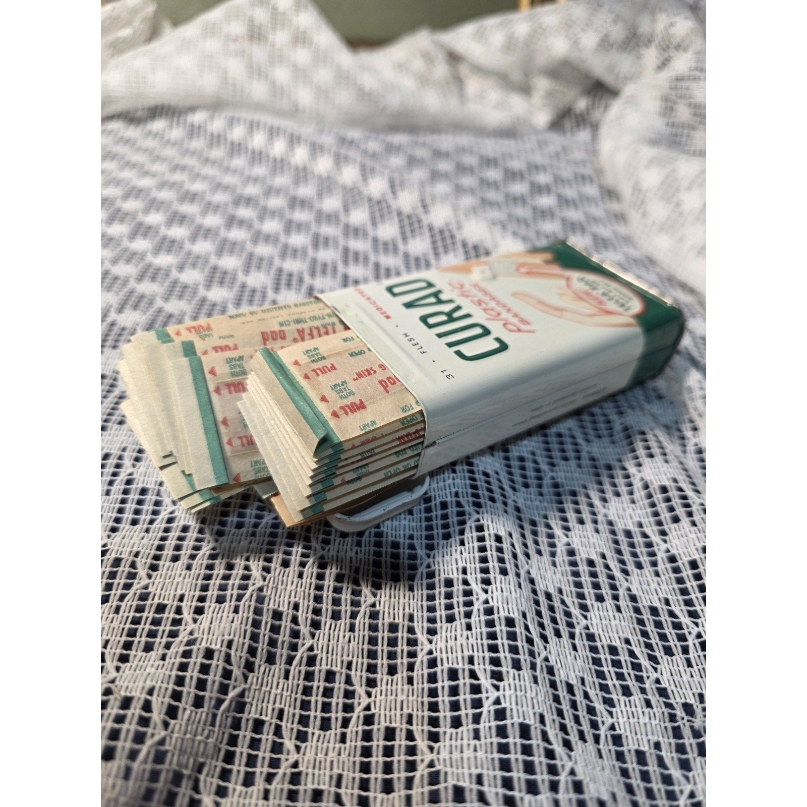Vintage Curity Curad Tin Medicated Bandages 43 cent Embossed Tin W/ bandages