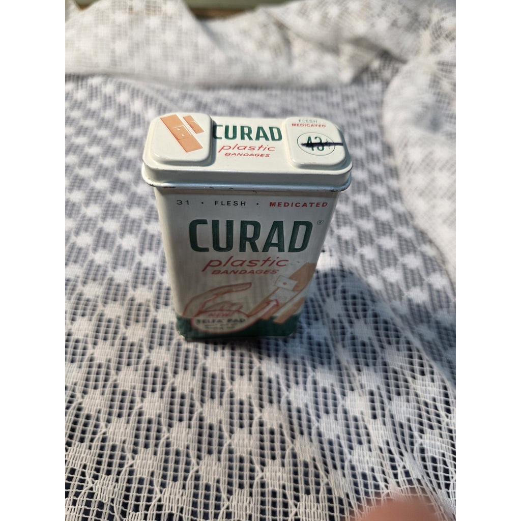 Vintage Curity Curad Tin Medicated Bandages 43 cent Embossed Tin W/ bandages