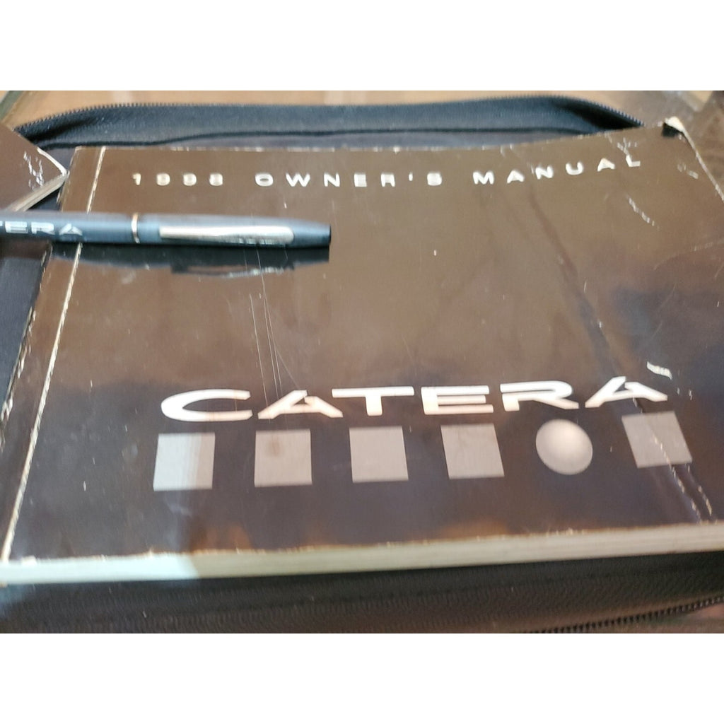 1998 CADILLAC CATERA OWNERS MANUAL SET W/ LEATHER CASE & PEN