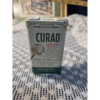 Vintage Curity Curad Tin Medicated Bandages 43 cent Embossed Tin W/ bandages
