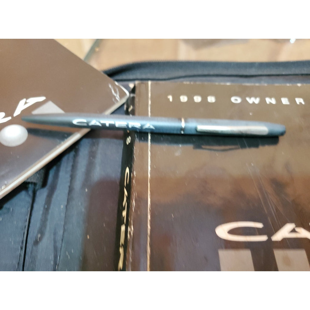 1998 CADILLAC CATERA OWNERS MANUAL SET W/ LEATHER CASE & PEN